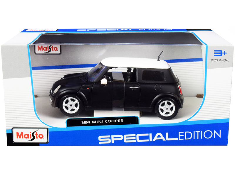 Brand new 1/24 scale diecast car model of Mini Cooper Matt Black with White Top die cast model car by Maisto.
Brand new