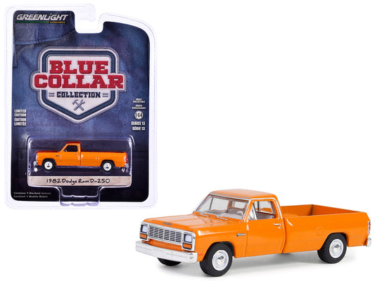 Brand new 1/64 scale diecast car model of 1982 Dodge Ram D-250 Pickup Truck DOT Orange "Blue Collar Collection" Series 1