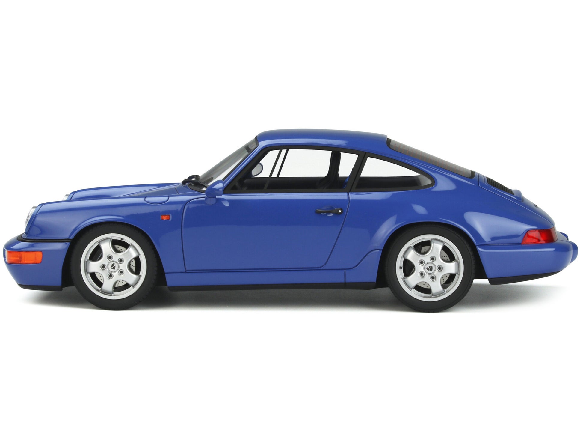 Brand new 1/18 scale car model of 1992 Porsche 964 RS Blue model car by GT Spirit.
Brand new box.
Real rubber tires.
